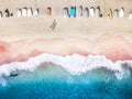 Aerial view of a sandy beach in Australia with the boats standing on the sand