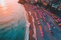 Aerial view of sandy beach with colorful umbrellas, swimming people in sea bay with transparent blue water in summer Royalty Free Stock Photo