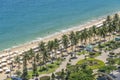 Aerial view of a sandy beach with sea water and coconut palm trees in the resort town of Nha Trang Vietnam Royalty Free Stock Photo