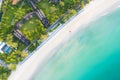 Aerial view of sandy beach with tourists swimming in beautiful clear sea water in Phuket, Thailand Royalty Free Stock Photo