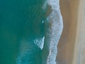 Aerial view sandy beach and waves Beautiful tropical sea in the morning summer season image by Aerial view drone shot High angle Royalty Free Stock Photo