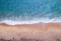 Aerial view sandy beach and waves Beautiful tropical sea in the morning summer season image by Aerial view drone shot, high angle Royalty Free Stock Photo