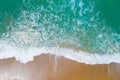 Aerial view sandy beach and waves crashing on sand. Beautiful tropical sea in the morning summer season image by Aerial view drone Royalty Free Stock Photo