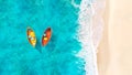 Aerial View of Sandy Tropical Beach and Ocean with Two Yellow and Red Boats Floating on Turquoise Water Banner Royalty Free Stock Photo