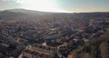 Aerial view of Sant Celoni city in Catalonia. Dusk early morning shot against the sun