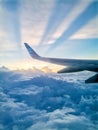 Aerial view from Santorini Island from a plane with window and airplane. Greece Royalty Free Stock Photo