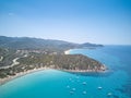 Aerial view of sardinia shoreline with boat and crystal clear blue turquoise sea - Mari pintau - Painted Sea TRAVEL in SARDINIA