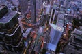 Aerial view of Sathorn intersection or junction with cars traffic, Bangkok Downtown, Thailand. Financial district and business