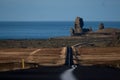 Aerial view of a scenic asphalt road leading to the shore of Snaefellsness, Iceland