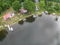 Aerial view of a scenic lake with a picturesque shoreline with houses