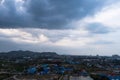 Aerial view scenic landscape of the city with storm cloud rain will coming Royalty Free Stock Photo