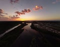 Aerial view of a scenic sunset over a riverside city Royalty Free Stock Photo