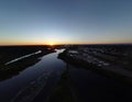 Aerial view of a scenic sunset over a riverside city Royalty Free Stock Photo