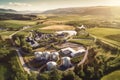 aerial view of a scenic whisky distillery in a rural landscape