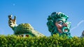 Aerial view of sculptures over bushes in Float Mardi Gras Moonrise museum in New Orleans