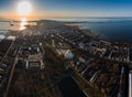 Aerial view of the sea capital of Russia Kronstadt at sunset, the golden dome of the huge main naval cathedral of St