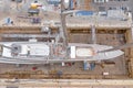 Aerial view of sea dry dock in La Ciotat city, France, the cargo crane, boats on repair, a luxury sail yacht and motor