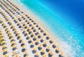 Aerial view of sea, empty sandy beach with sunbeds and umbrellas Royalty Free Stock Photo