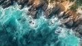 Aerial view of sea and rocks, ocean blue waves crashing on shore Royalty Free Stock Photo