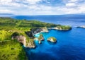 Aerial view at sea and rocks. Turquoise water background from top view. Summer seascape from air. Atuh beach, Nusa Penida, Bali, I Royalty Free Stock Photo