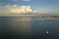 Aerial view of sea shore near Venice, Florida with white yachts at sunset floating on sea waves. North and South Jetty Royalty Free Stock Photo