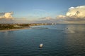 Aerial view of sea shore near Venice, Florida with white yachts at sunset floating on sea waves. North and South Jetty Royalty Free Stock Photo