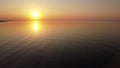 Aerial view of a sea at sunrise and clear sky