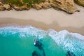 Aerial view of sea waves breaking sandy beach Royalty Free Stock Photo