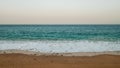 Aerial view of sea waves breaking sandy beach Royalty Free Stock Photo