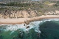 Aerial view of sea waves on a sandy beach Royalty Free Stock Photo