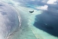 Seaplane aerial view of beautiful tropical Maldive island and se Royalty Free Stock Photo