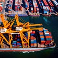 Aerial view of seaport cargo loading area with cargo ships and containers, ocean transport shipping logistics Royalty Free Stock Photo