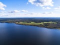 Aerial view of seashore with beach, lagoons. Coastline with sand and water. Landscape. Aerial photography. Birdseye. Sky, clouds. Royalty Free Stock Photo