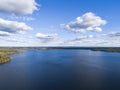 Aerial view of seashore with beach, lagoons. Coastline with sand and water. Landscape. Aerial photography. Birdseye. Sky, clouds. Royalty Free Stock Photo