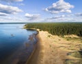 Aerial view of seashore with beach, lagoons. Coastline with sand and water. Landscape. Aerial photography. Birdseye. Sky, clouds. Royalty Free Stock Photo