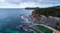 Aerial view of seaside ocean swimming pool set against rock cliffs at Bilgola Beach, Sydney Australia Royalty Free Stock Photo