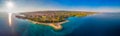 Aerial view of seaside promenade in Supetar town on Brac island with palm trees and turquoise clear ocean water, Supetar, Brac, Cr Royalty Free Stock Photo