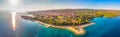 Aerial view of seaside promenade in Supetar town on Brac island with palm trees and turquoise clear ocean water, Supetar, Brac, Cr Royalty Free Stock Photo