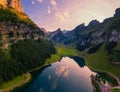 Aerial view of the Seealpsee lake in the Swiss Alps at sunset