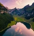 Aerial view of the Seealpsee lake in the Swiss Alps at sunset