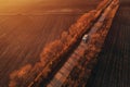 Aerial view of semi-truck on the road in sunset, drone pov Royalty Free Stock Photo