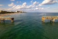 Aerial view of a seperated broken weathered pier in Fort Lauderdale, Florida