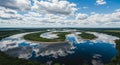 Aerial View of a Serene River with Cloud Reflections Royalty Free Stock Photo