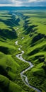 Tranquil Aerial View Of Green River Flowing Through Vibrant Field Royalty Free Stock Photo