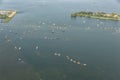 Aerial view of several sea scout sloops at Dutch lake