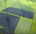 Aerial View : Shadows of windturbines in fields Royalty Free Stock Photo