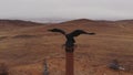 The shaman eagle column in the Tazheranskaya steppe.