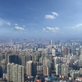 Aerial view of Shanghai cityscape / modern skyscraper city in misty sky background behind pollution haze, in Shanghai, China Royalty Free Stock Photo