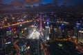 Aerial View of Shanghai Cityscape over the Pudong Financial District at night. Trade zone skyline and Huangpu River. Royalty Free Stock Photo