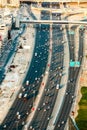 Aerial view of Sheikh Zayed highway road in Dubai with traffic in the evening